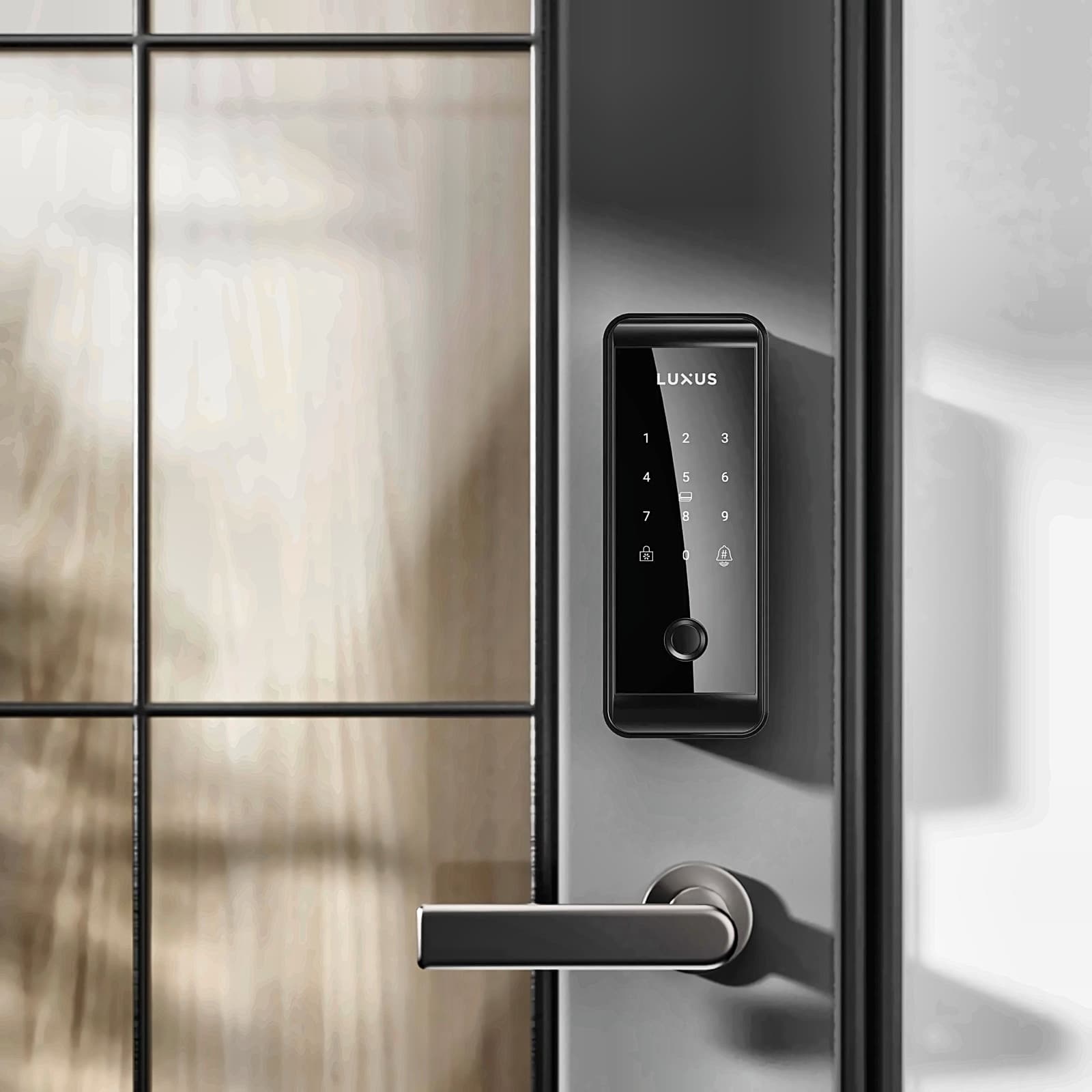 Smart keypad door lock installed on a modern glass door