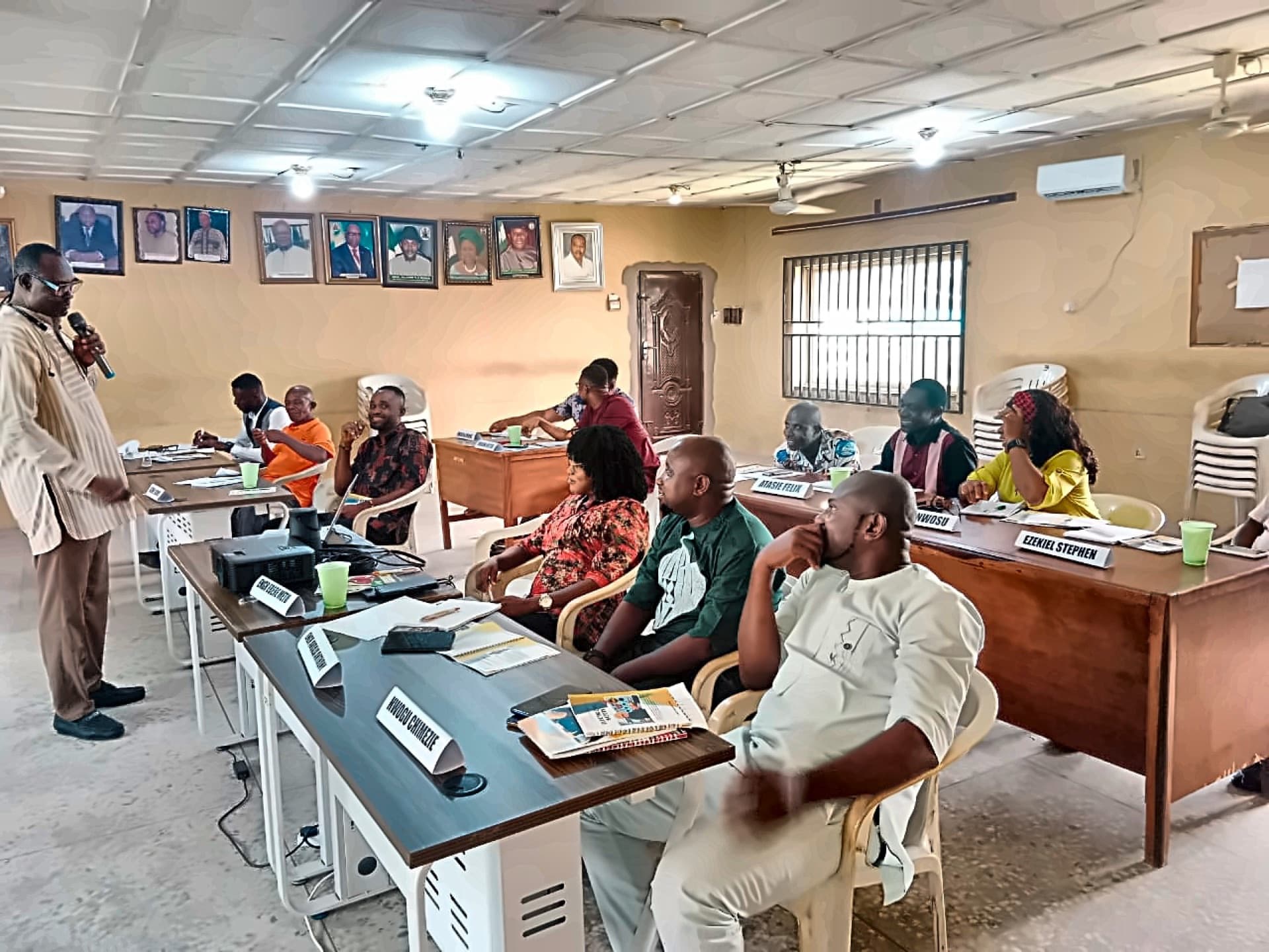 Facilitator addressing participants at a corporate training workshop